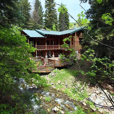 Log Cabin On The Stream